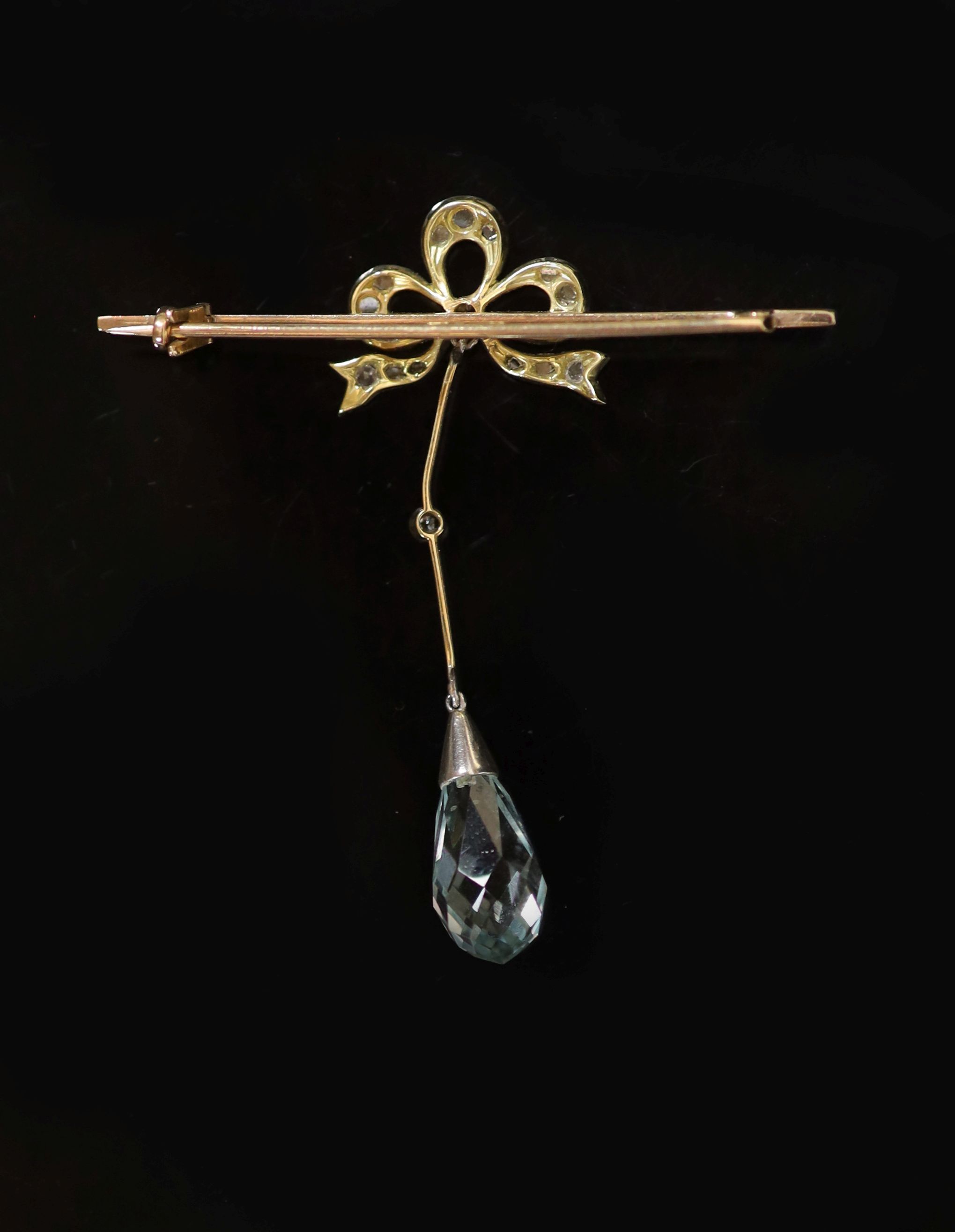An Edwardian gold, aquamarine and rose and round cut diamond set drop bar brooch